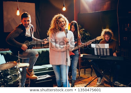 Stock fotó: Guitarist And Drummer Playing