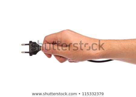 Foto stock: Man Is Holding A Black Outlet In The Hand Isolated