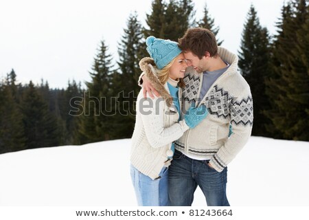 [[stock_photo]]: Young Couple In Alpine Snow Scene