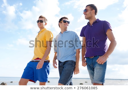 Stok fotoğraf: Guy Hanging On A Beach