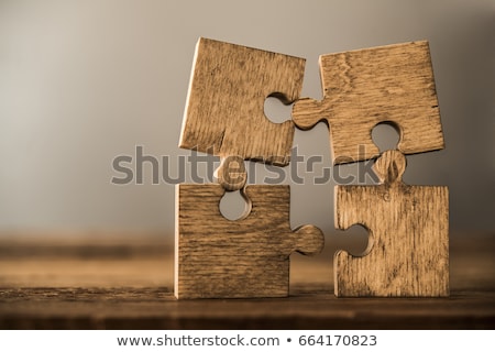 Stock photo: Piece Missing From Jigsaw Puzzle On Wooden Table
