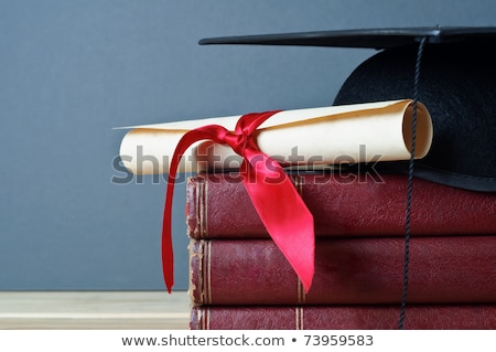 Close Up Of Books And Mortarboard On Wooden Table Stock foto © Frannyanne