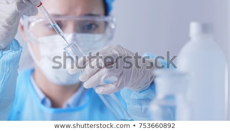 Stok fotoğraf: Asian Female Scientist Doing Research