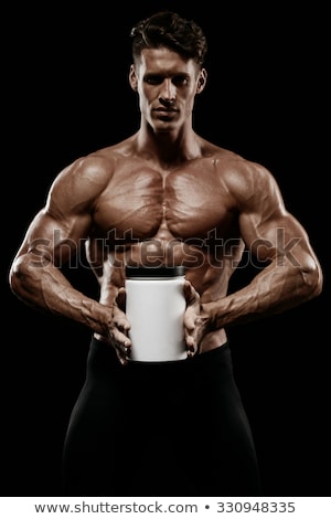 Stok fotoğraf: Muscular Man With Protein Jars On White