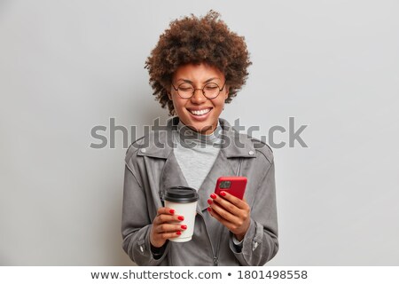 Zdjęcia stock: Portrait Of Happy Young Businesswoman Using Mobile Phone In Offi