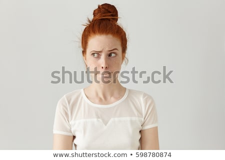 Zdjęcia stock: Portrait Of A Confused Young Woman