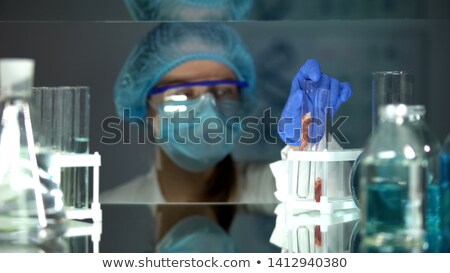 Stockfoto: Scientist Taking Sample Of Meat In Test Tube