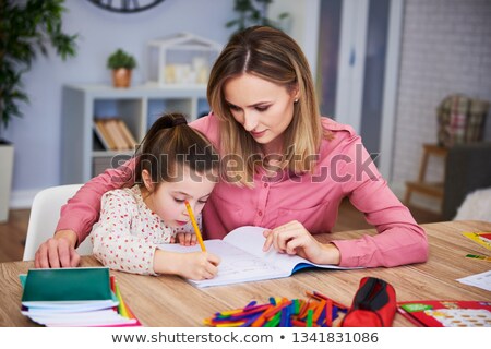 Сток-фото: Mother Helping Daughter With Difficult Homework