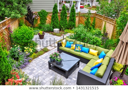 Stock foto: Beautiful Green Garden With Flowers On Luxury Backyard