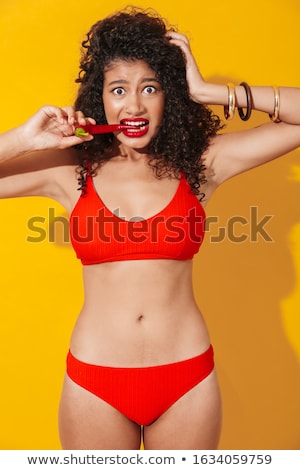 Stock foto: Confused Shocked Woman Eat Pepper Chili