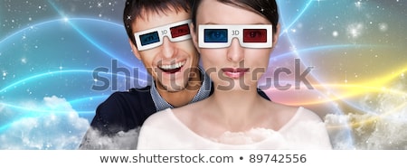 Foto stock: Portrait Of Young Stylish Modern Man Wearing 3d Glasses Watching