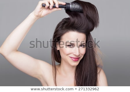 Сток-фото: Woman Holding Her Hair And Wondering