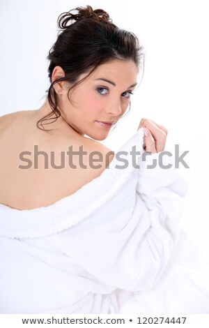 Stock foto: Brunette Seductively Removing Bath Robe