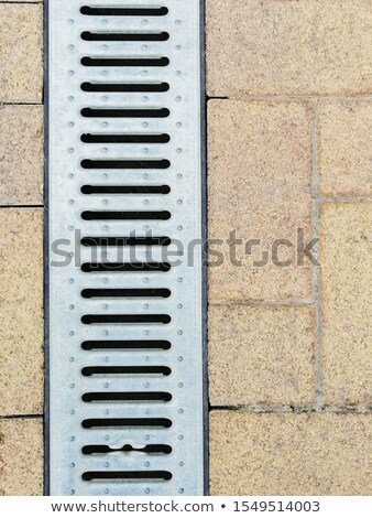 Foto stock: Steel Grating Drain Cover