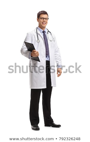 Stok fotoğraf: Full Length Portrait Of The Smiling Doctor Standing On A White