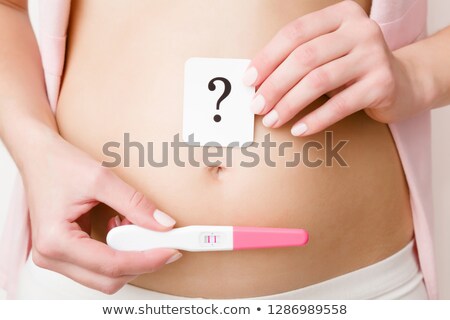 Stok fotoğraf: Mother Questioning Teenage Daughter About Pregnancy Test
