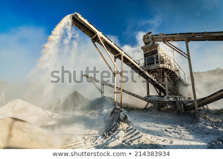 Foto stock: Working Gravel Crusher Industrial Background