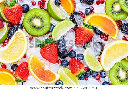 Сток-фото: Assortment Of Tropical Exotic Fruits With Smoothie And Fresh Juice