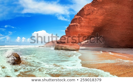 Stockfoto: Sandy Beach Sea Waves And Mountain At Coast