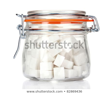 Stockfoto: White Sugar In Glass Bank