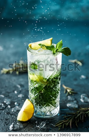 Stockfoto: Lemon Mojito Cocktail With Lime Mint And Raspberry Cold Drink With Ice