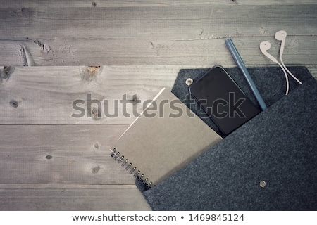 [[stock_photo]]: Black Cotton Textile Bag On A Gray Floor