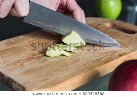 Foto d'archivio: Glass Of Fresh Organic Apple Juice With Red Apples On Chopping Board On Wooden Background With Knife