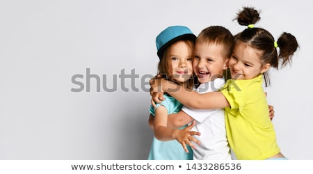 Stok fotoğraf: Group Of Sisters Portrait In Studio White Background