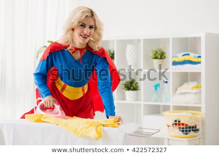 ストックフォト: Superwoman Ironing Laundry