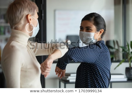 Stock fotó: Smiling Woman In A Friendly Team Meeting