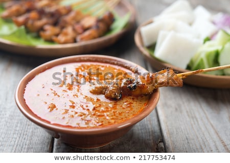 Chicken And Mutton Satay With Ketupat And Peanut Sauce Foto d'archivio © szefei