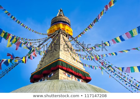 Foto stock: Buddhist Shrine Boudhanath Stupa With Pray Flags Over Blue Sky