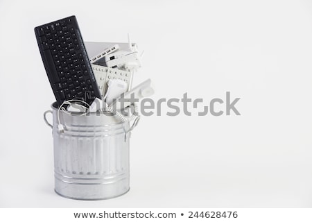 Foto stock: Garbage Can Filled With Obsolete Office Equipment