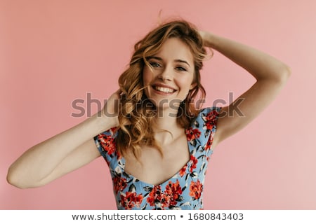 Foto d'archivio: Pretty Blond Woman In Blue Pants And Shirt Isolated On White