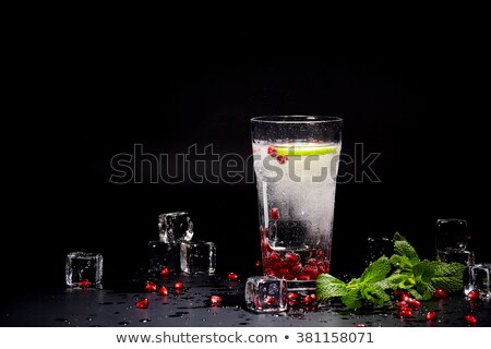 Сток-фото: Sweet Cherry And Ice Cube On Black Background