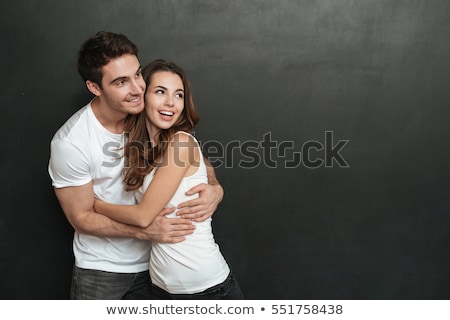 Foto stock: M · casal · atraente · no · fundo · escuro