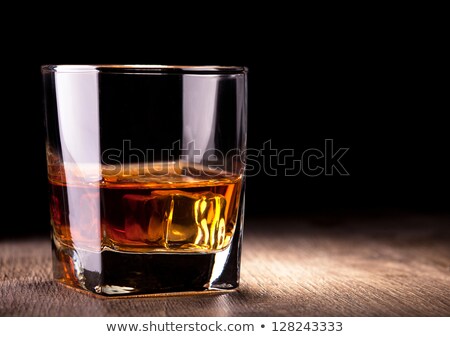 Stockfoto: Glass Of Whiskey On Dark Background Close Up