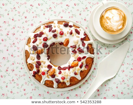 Stock fotó: Delicious Pastry With Raisins And A Cup Of Coffee Top View