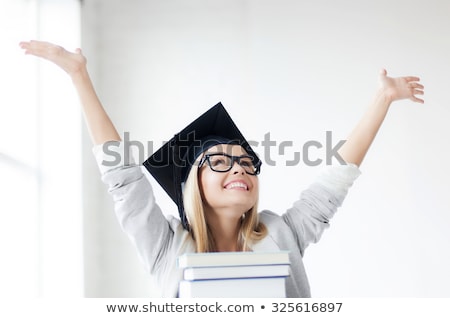 Foto stock: Happy Students Or Bachelors In Mortar Boards
