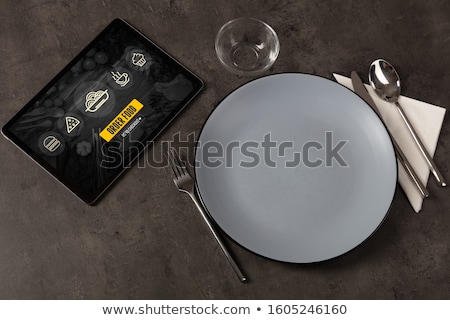 Stok fotoğraf: Online Food Order Concept On Laid Table