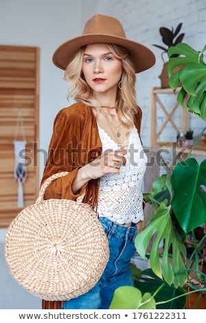 [[stock_photo]]: Beautiful Woman Posing In A Yellow Interior