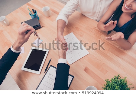 Stock fotó: Real Estate Broker Or Sale Agent Giving Consultation To Customer