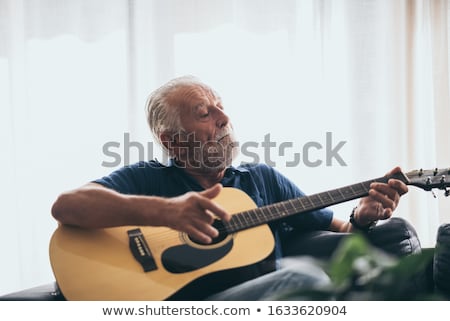 Stock fotó: Man With Guitar