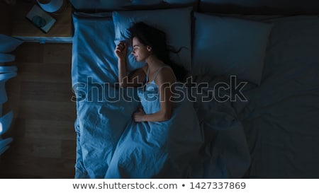 Stockfoto: Portrait Of Young Beautiful Sleeping Woman On Bed At Bedroom