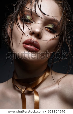 Stok fotoğraf: Young Brunette With Creative Makeup