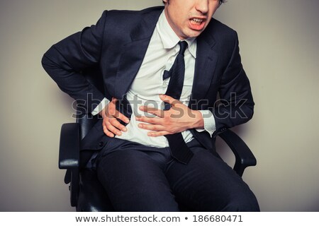 Stockfoto: Man Having Tummy Ache