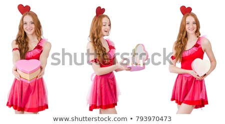 Foto d'archivio: Pretty Young Model In Mini Pink Dress Holding Gift Box Isolated On White