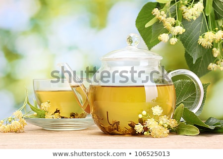 Stock photo: Cup With Linden Tea And Flowers