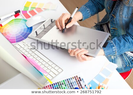 Сток-фото: Graphic Designer Drawing Something On Graphic Tablet At The Home