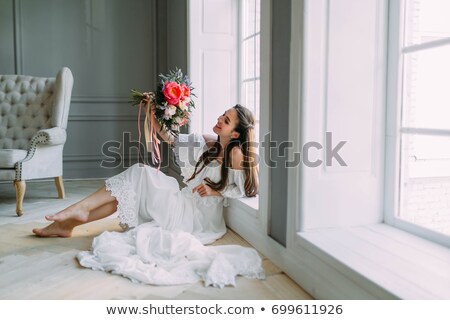 Foto stock: Young Beautiful Bride With Bouquet